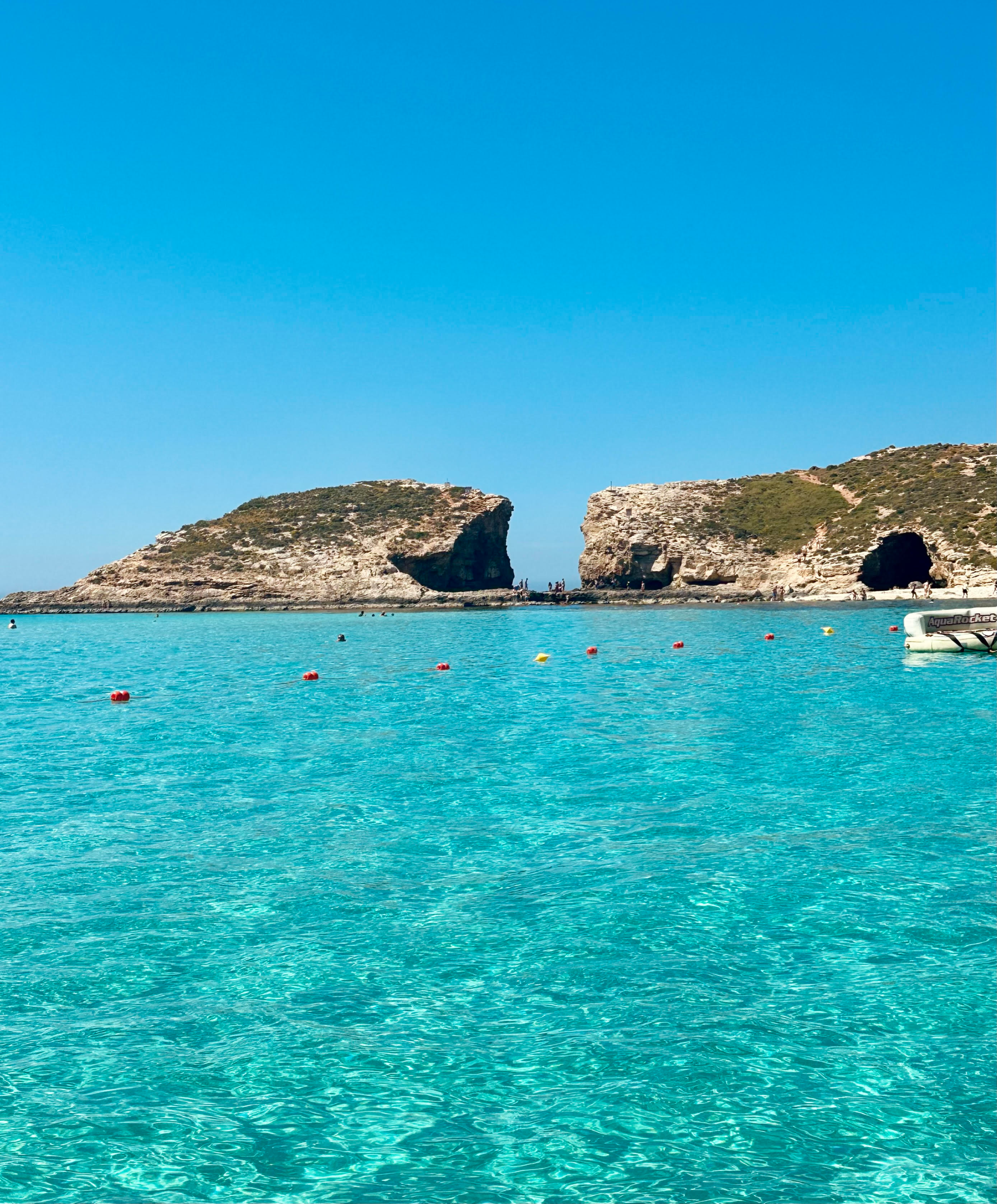 Crystal-clear turquoise waters of Blue Lagoon on Comino Malta.