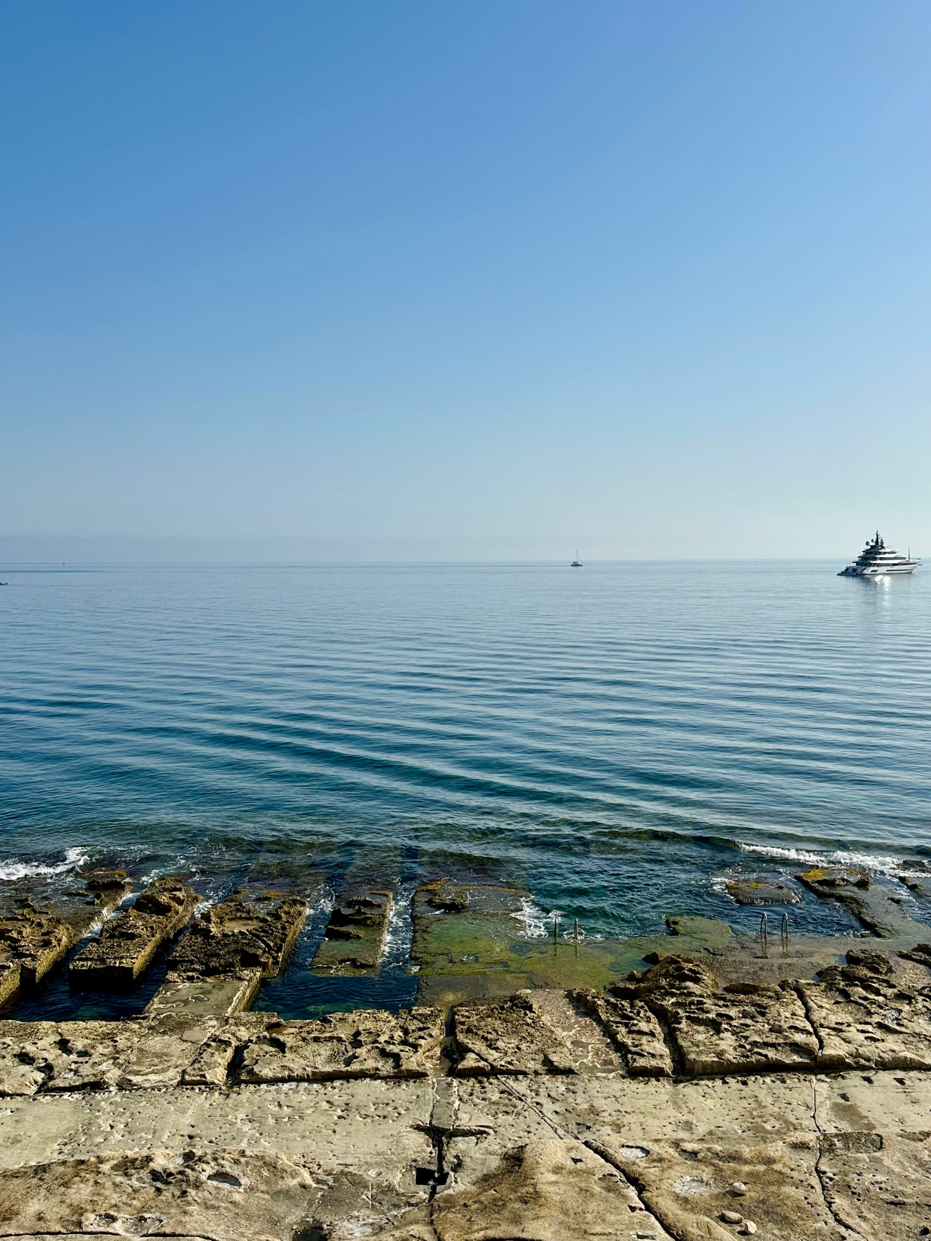 Sunny coastal view of Sliema, Malta with blue skies – typical Maltese weather