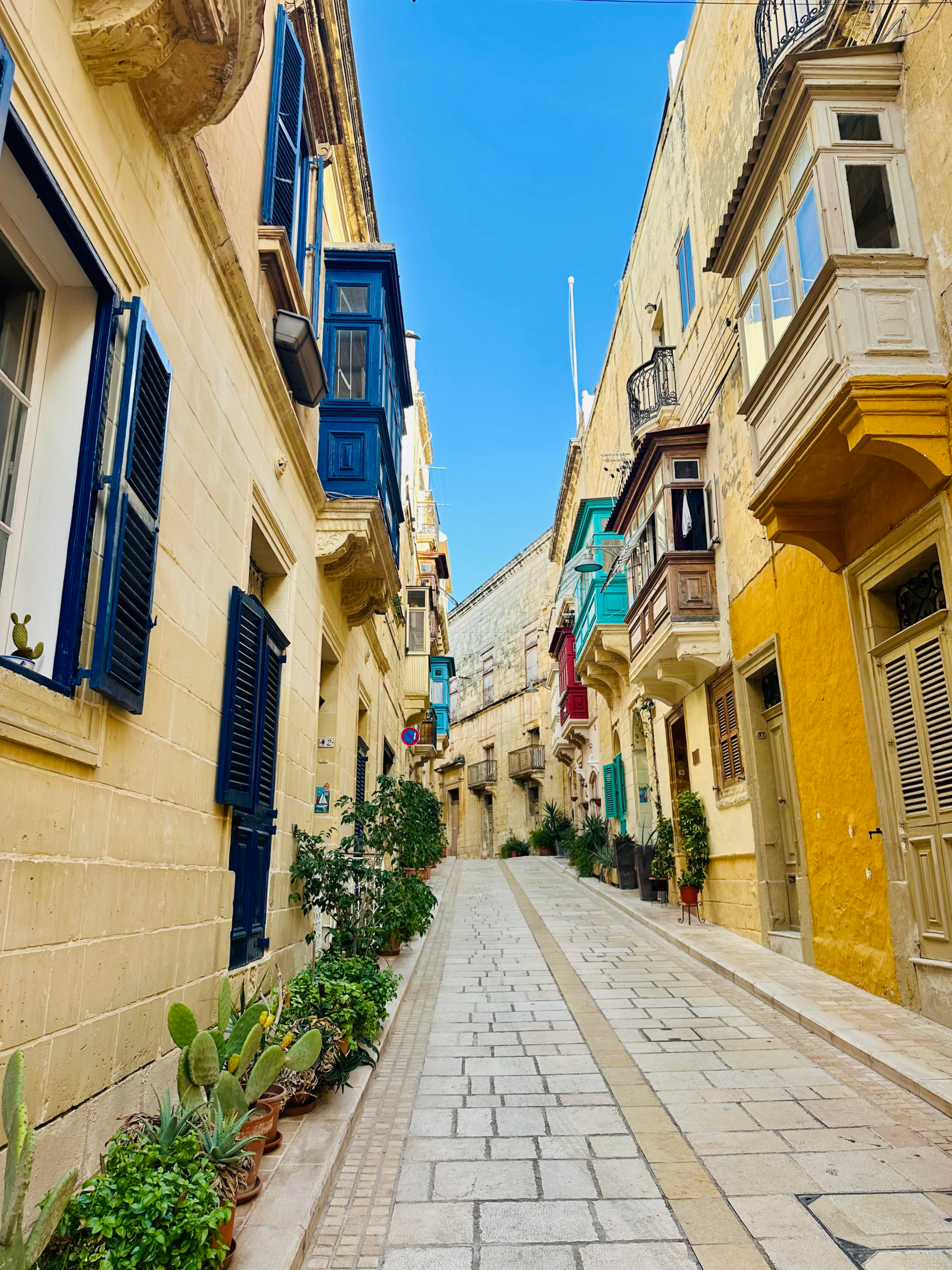 Colourful traditional Maltese balconies lining Triq il-Palazz tal-Isqof in Birgu