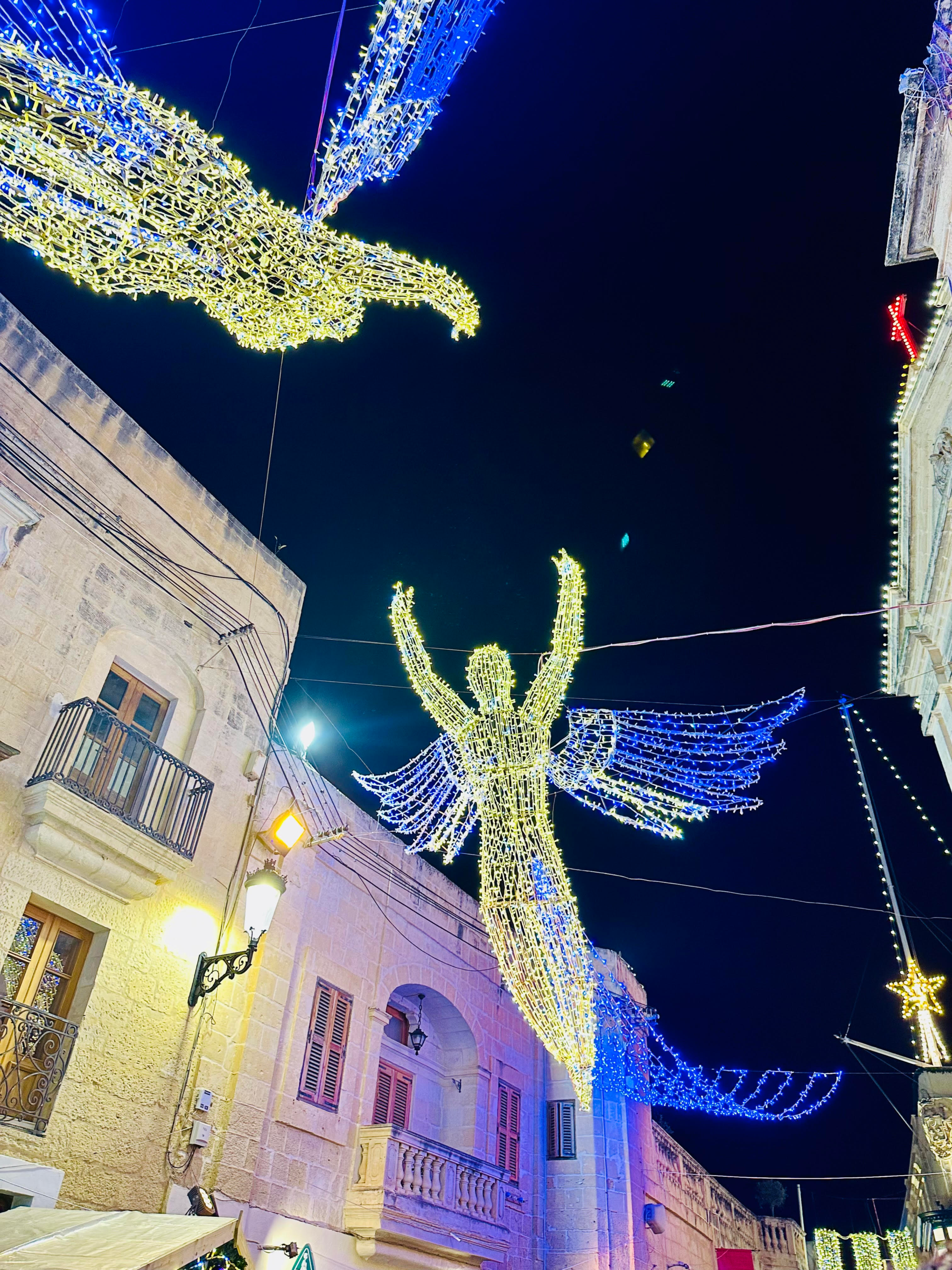 Festive street decorations and Christmas lights along the historic streets of Rabat, Malta during Natalis Notabilis.