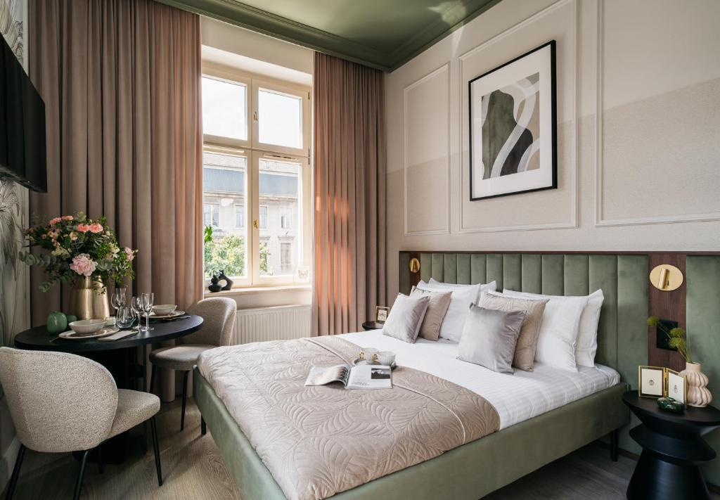 Cosy hotel room in central Krakow with modern amenities, perfect for a winter city break.