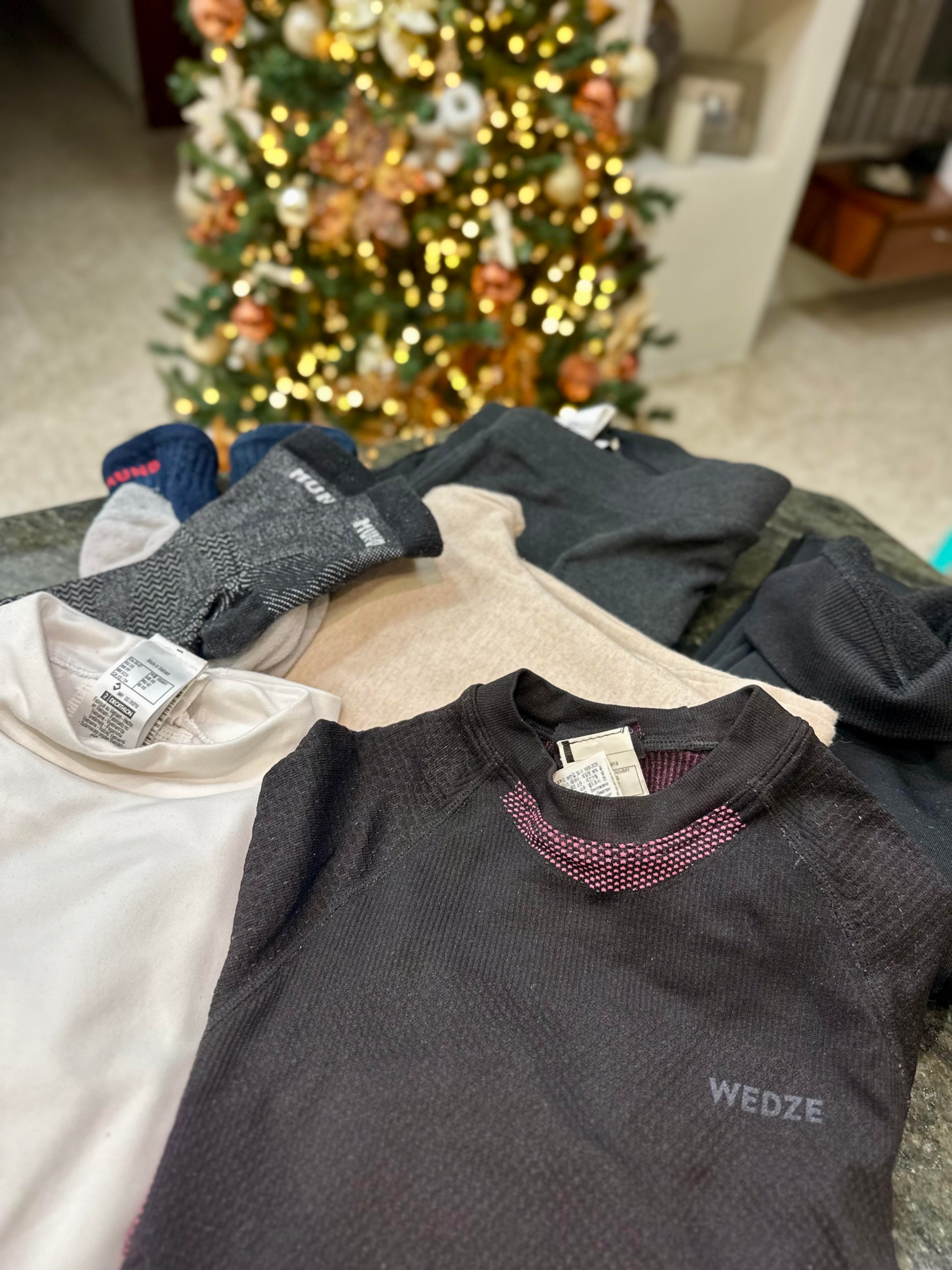 Base layers for winter travel showing what to wear in cold weather to stay warm